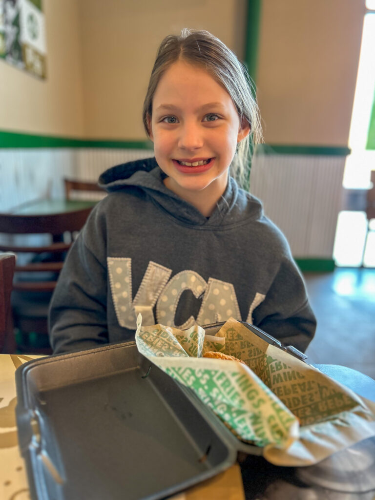 Daughter eating lunch on mommy and daughter date