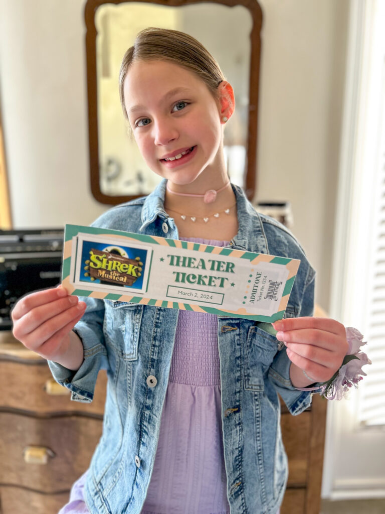 Daugther with ticket for Shrek the Musical