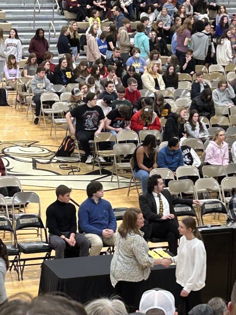 daugher getting recognized at honors convocation