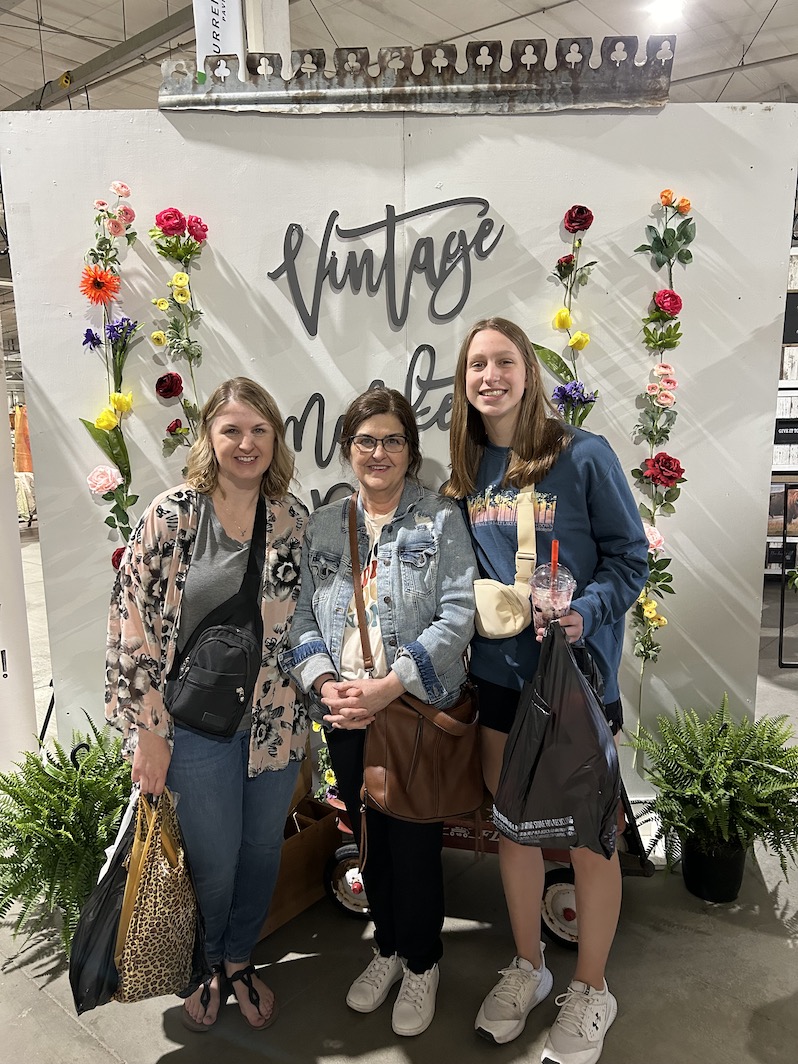 3 generations, mother, grandmother, and daugther shopping at Vintage Market Days