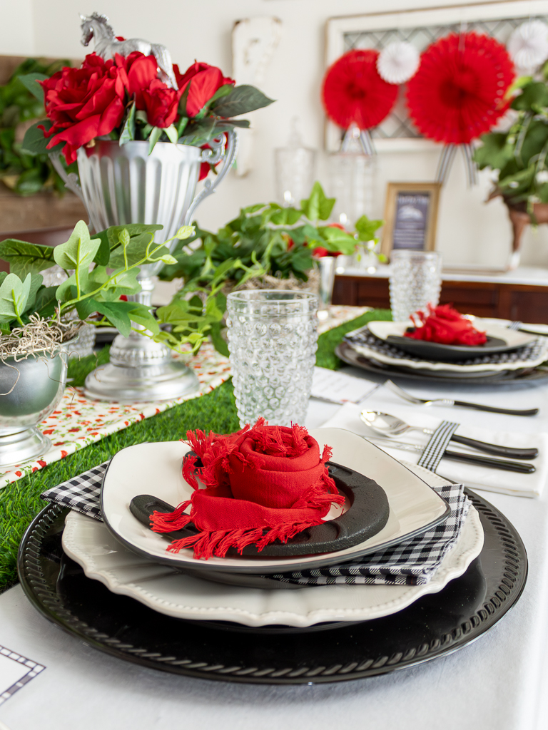 Red and black tablescape styled for a horse-themed Kentucky Derby party