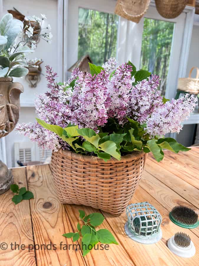 Lilacs in a vintage basket from The Ponds Farmhouse - Week in Rewind Volume 81