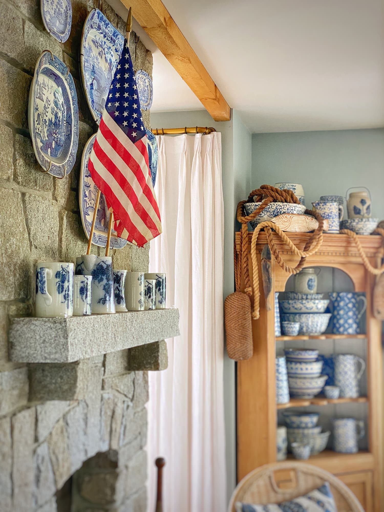 Patriotric summer fireplace with American flags and vintage plate display from Molly in Maine - Week in Rewind Volume 85 - Midwest Life and Style Blog