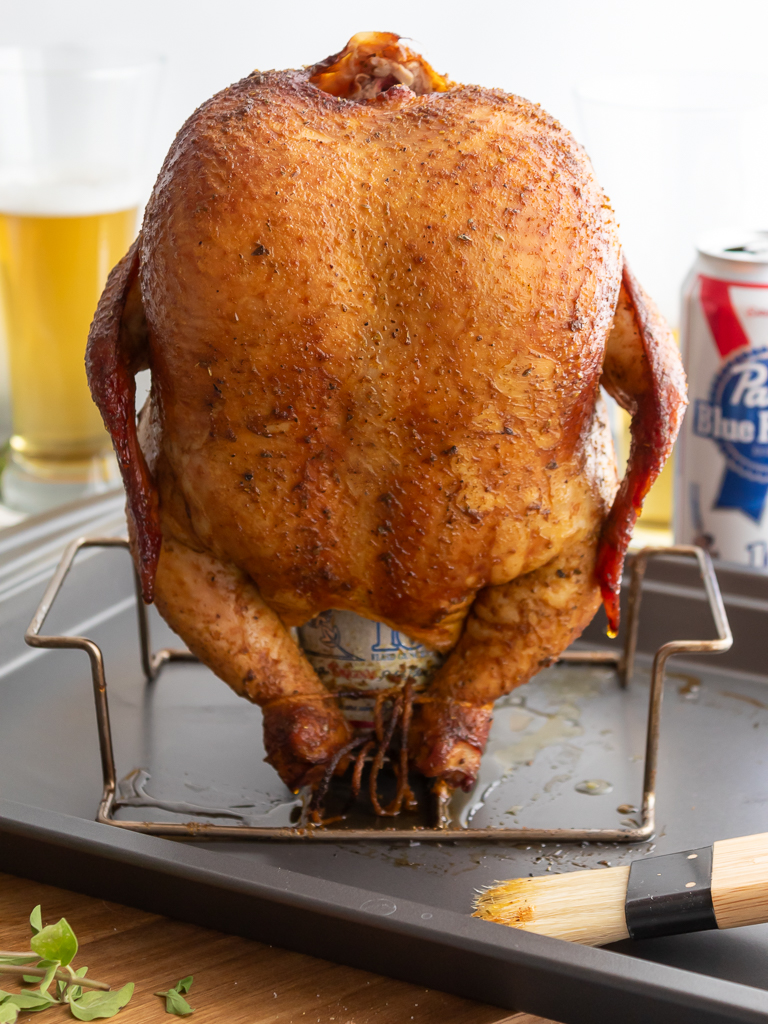 Smoked Beer Can Chicken resting on beer can stand 