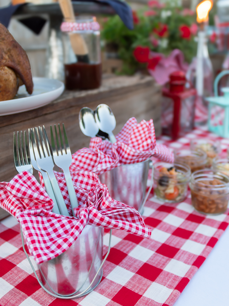 mini galvanized pails used to hold silverware for a backyard cookout