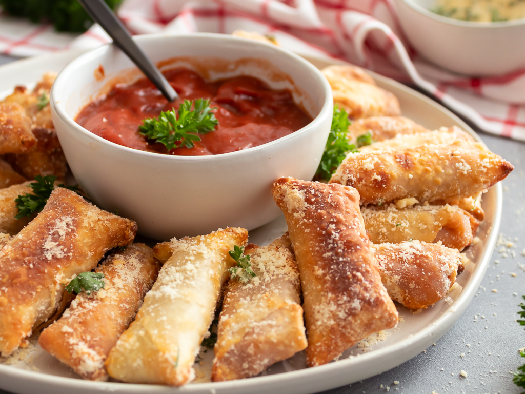 Homemade Wonton Pizza Rolls in the Air Fryer with dipping sauce