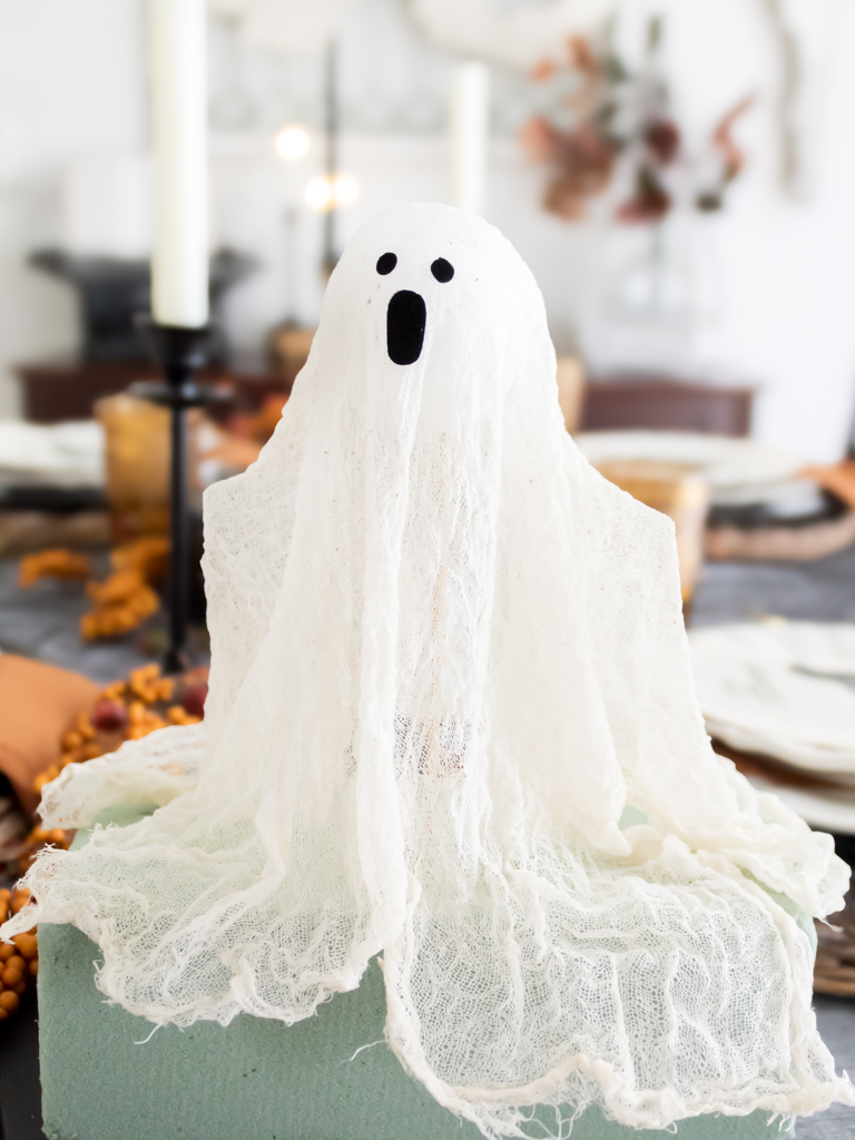 Dried DIY cheescloth Pottery Barn ghost dupe with felt mouth and eyes attached