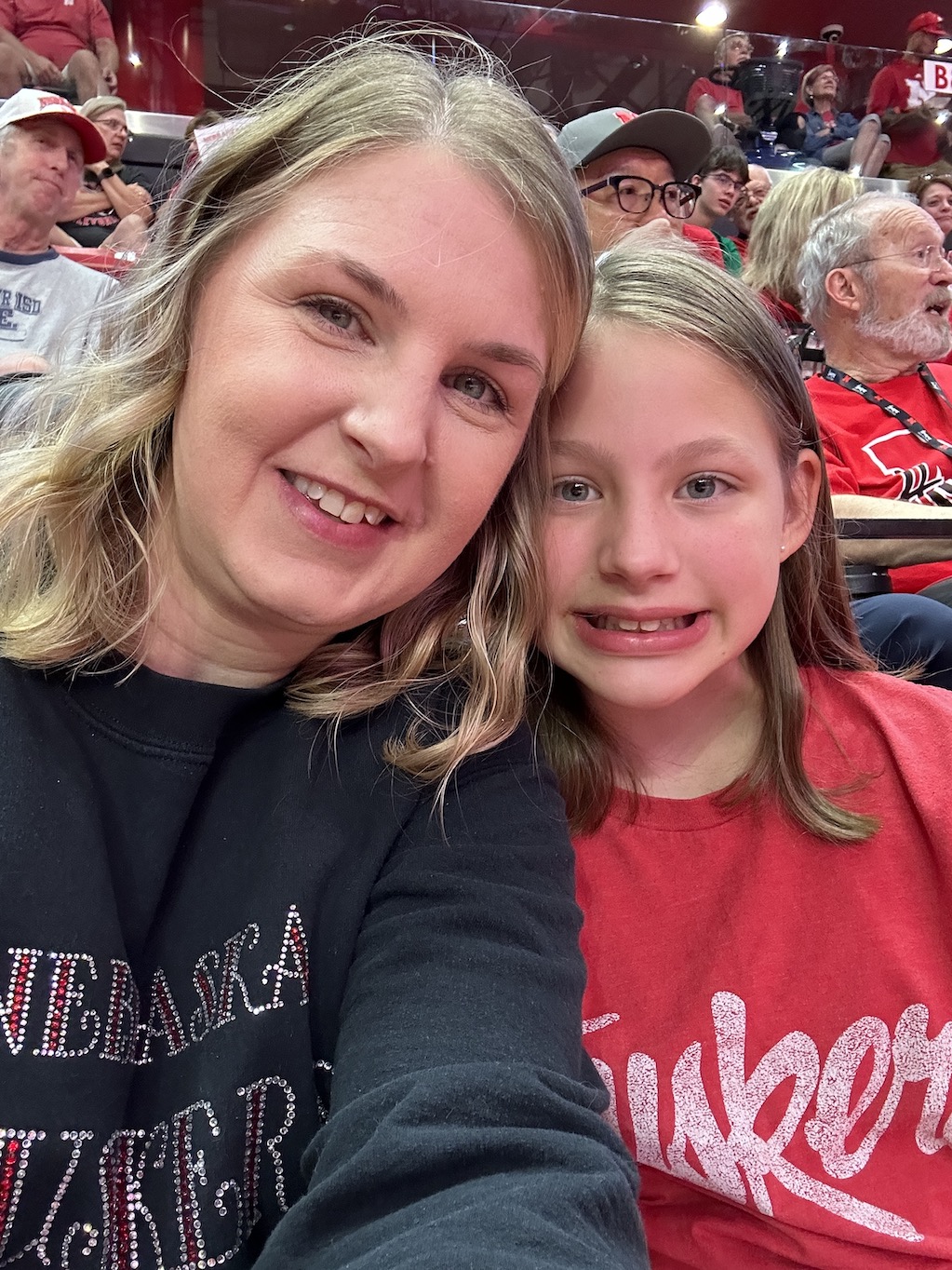 Mom and daughter at Husker volleyball game