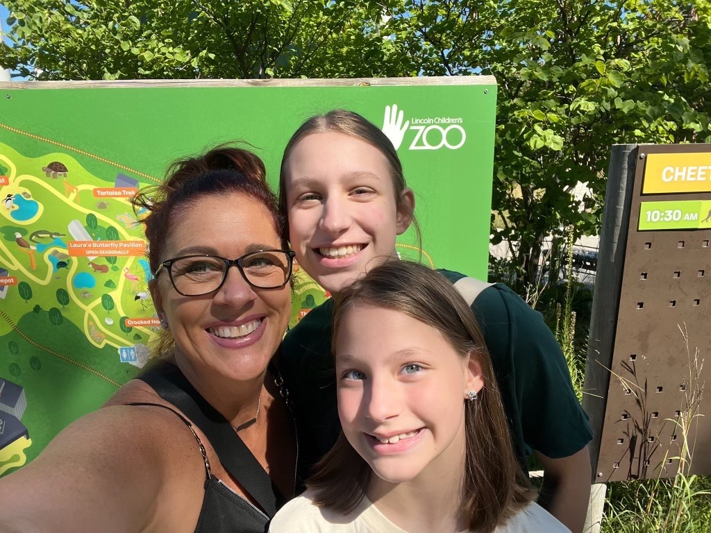 Grandmother with granddaughters at the zoo