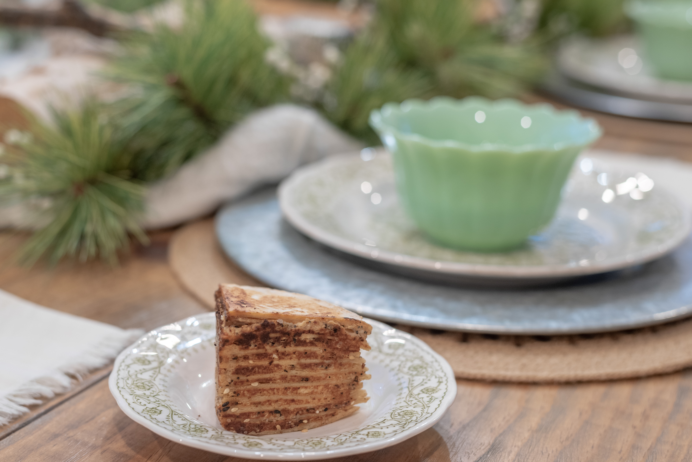 Slice of tortilla cake served on a plate for a dinner party