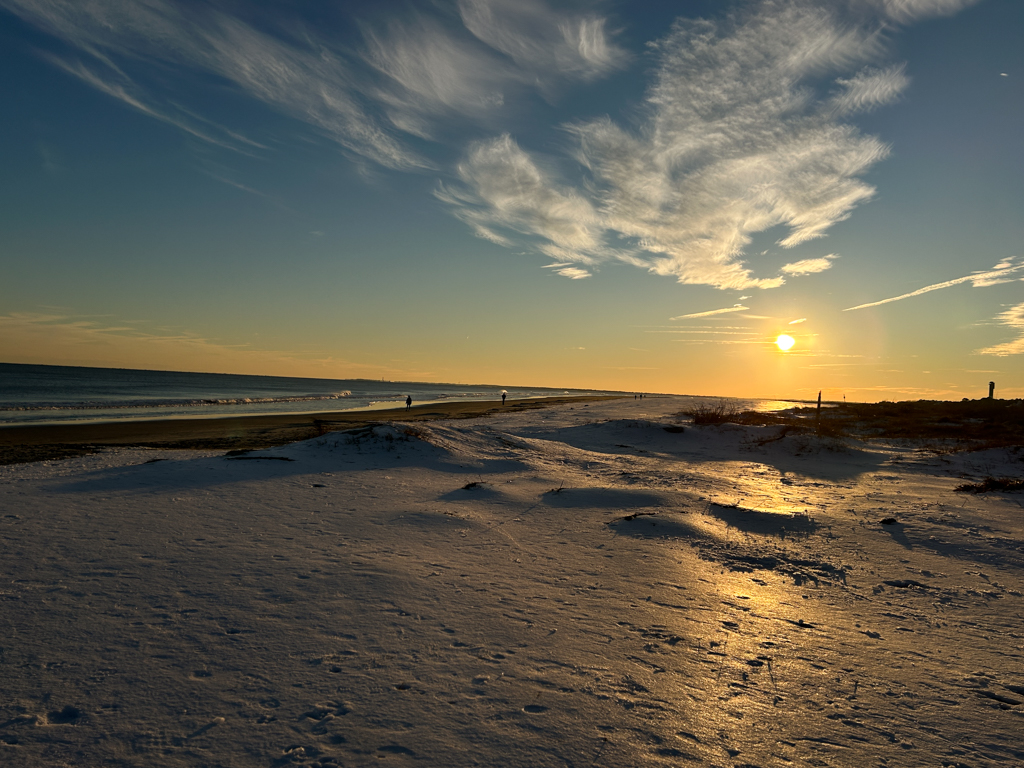 The beach at sunset with snow near Charleston, SC