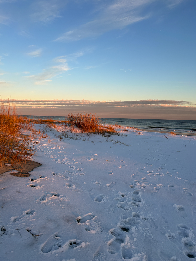 The beach at sunset with snow near Charleston, SC